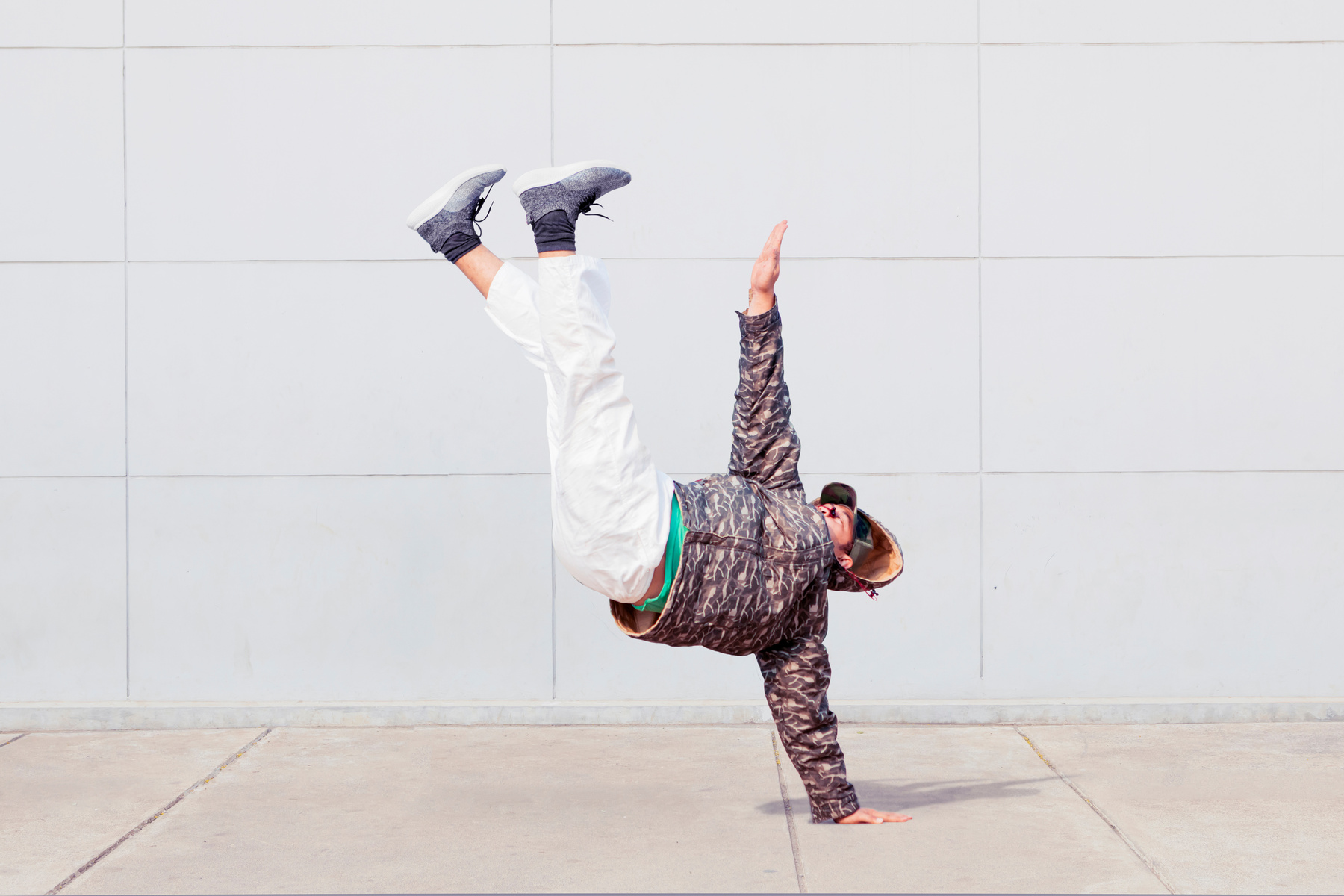 Man Wearing Sweater While Doing Hip Hop Dance